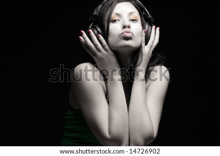 a beauty girl enjoying and listening the music