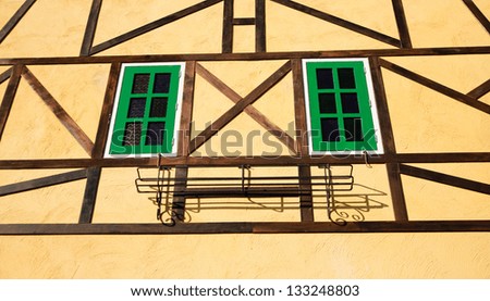 Green wooden square windows
