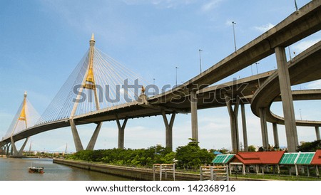 BANGKOK - JUNE 8 : Bhumibol Bridge, pictured on June 8th, 2013, in Bangkok, Thailand. The bridge crosses the Chao Phraya River twice, with two striking cable-stayed spans of lengths of 702 and 582 m.