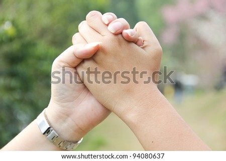 The two men shake hands