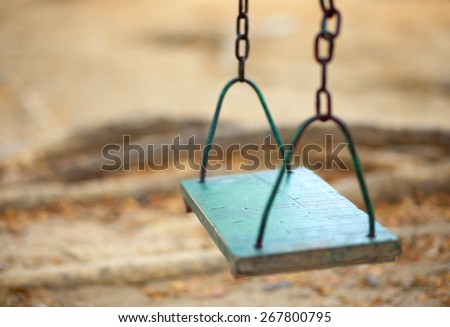 empty wood swing in the park