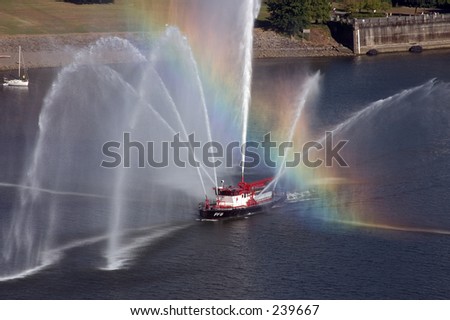 Rainbow across fire boat