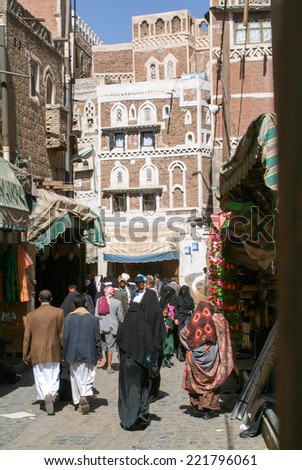 Sana, Yemen - 20 January 2008: people walking and buying on the market of old Sana on Yemen