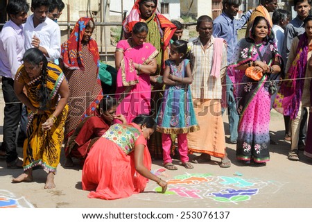 Hampi, India - 11 January 2015: Woman during a street design competition at Hampi on India