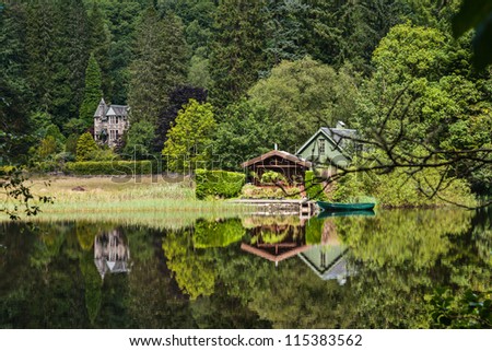 Victorian houses at the lakeside the of Loch Ard, Trossachs National Park, Stirling District, Scotland, United Kingdom