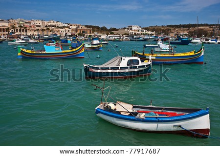 Colorful fishing boats in the fishing village Marsaxlokk, Malta