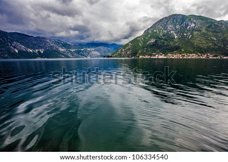 sea and mountains in bad rainy weather. Montenegro