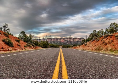 Landscapes with road after sunset. Utah state. USA.