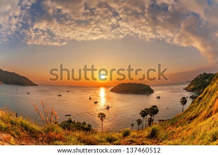 Tropical sea at beautiful sunset. Nature background. Fish-eye view