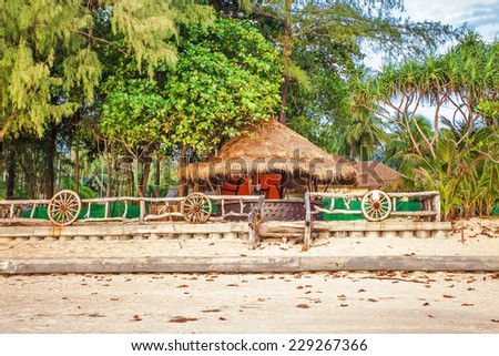 abandoned bar on a tropical beach