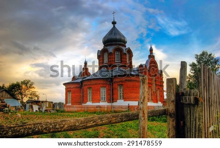 Old russian church in gloomy weather in sunset time