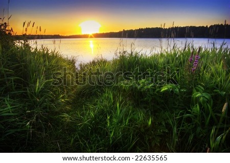 Sunset around lake. It is photographed in Russia. 60 kilometers from Moscow. The end of summer.
