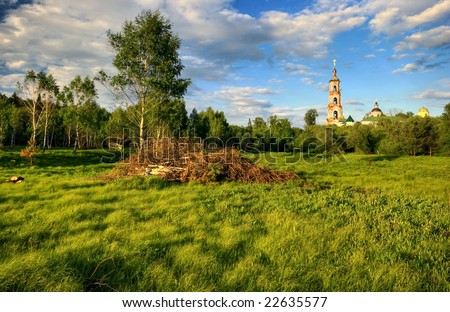 Sunshine summer field. It is photographed in Russia. 60 kilometers from Moscow. The end of summer.