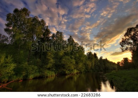 Sunset. Summer river. It is photographed in Russia. 60 kilometers on East from Moscow.
