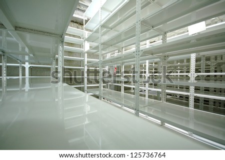 Empty warehouse racks, Empty metal shelf in storage room, storage concept
