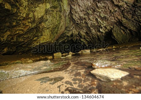 A path leading into cave, cave entrance