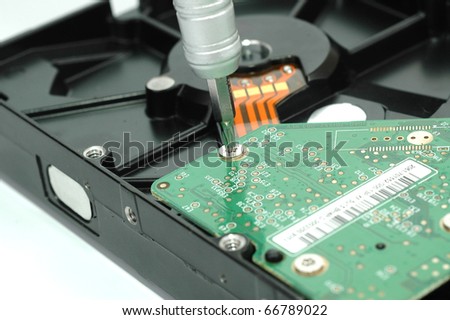 Close up of opened hard disk drive hard disc repairing concept