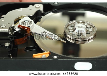 Close up of opened hard disk drive hard disc repairing concept , data saving concept
