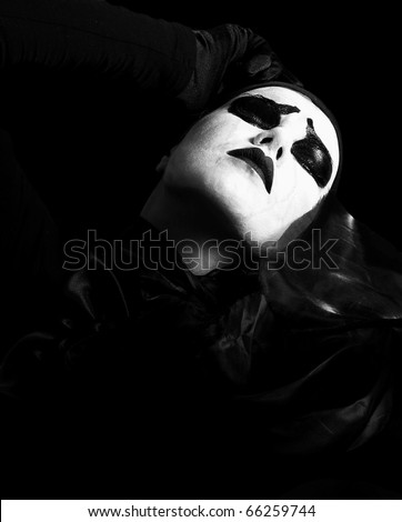 Black-and-white portrait. Woman in  make-up of  mime./Death Becomes Her