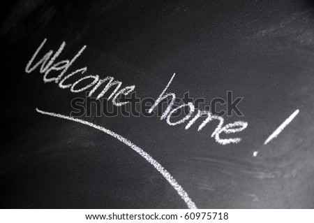 Welcome home - handwriting on blackboard
