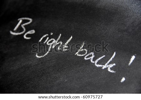 Be right back - handwriting on blackboard