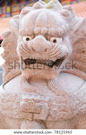 The lion statue on the Chinese Temple/The lion statue.