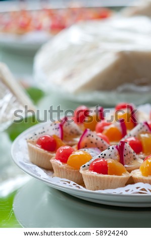 Fruit tart with cherry and dragon fruit