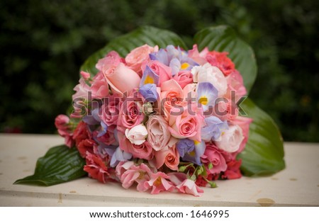 Wedding flowers from a bridal bouquet with a shallow depth of field on the front flowers