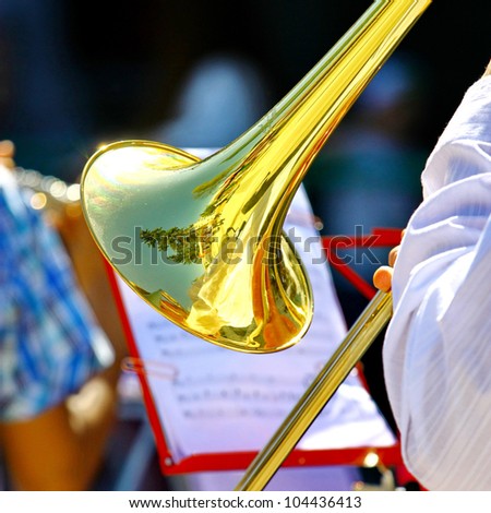 Musician playing the trumpet in the Orchestra