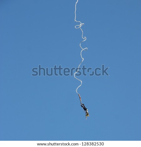 HELSINKI, FINLAND - JULY 27: Bungee jumping from a crane on July 27, 2012 in Helsinki. The height of the jump is 150 meters, the speed gained during a jump is about 120 km/h.