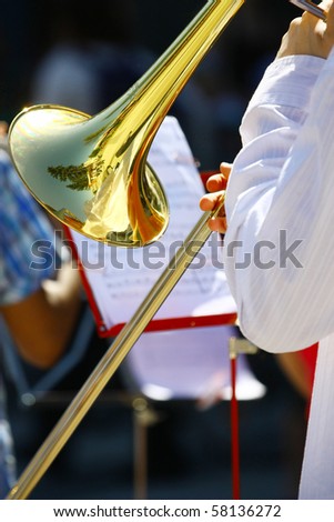 Musician playing the trumpet in the Orchestra