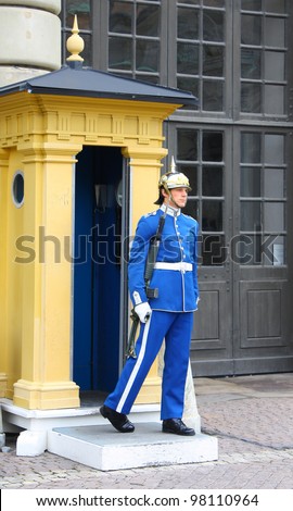 STOCKHOLM - JUNE 11: Guard near the Royal Palace on June 11, 2009 in Stockholm. The Royal Guards has been stationed at the Royal Palace since 1523 and is a popular tourist attraction.