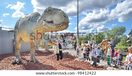  - stock-photo-vantaa-finland-august-people-look-at-dinosaur-exhibition-in-finnish-science-centre-heureka-98412422