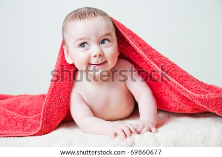 Baby Boy After Bath Wrapped in Red Towel Laying and Posing