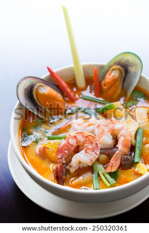 Tom yum soup ,Tom yam is a spicy clear soup typical in Thailand ,Thai Dish Cuisine.
