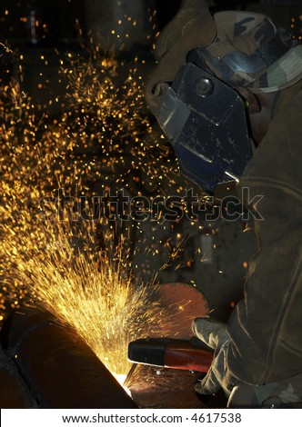 arc welder working at night