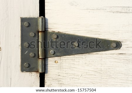 a close up picture of hinge on door