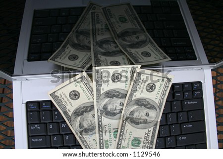 Laptop money reflection