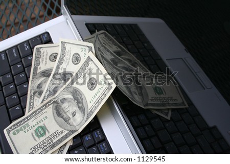 Laptop money reflection