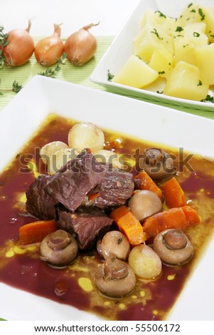 Beef in red vine sauce with vegetables
