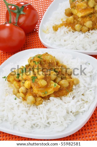 Delicious fish curry with chickpeas and rice