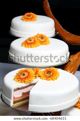 Sweet decorated fruit cake at the exhibition