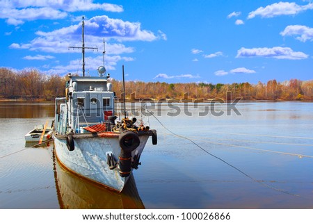 Moored launch boat at sunny weather