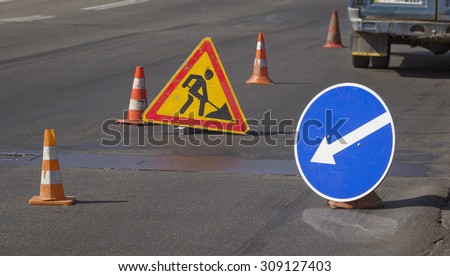 Road repairs and signs meaning a detour