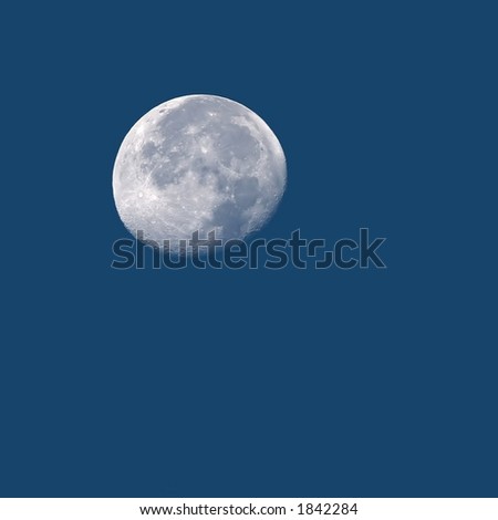 Detailed Photo of Full Moon in Daylight with Copy Space