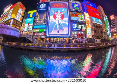 OSAKA, JAPAN - NOV 13: The Glico Man light billboard and other light displays on November 13, 2014 in Dontonbori, Namba Osaka area, Osaka, Japan. Namba is well known as an entertainment area in Osaka.