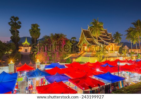 LUANG PRABANG, LAOS - DEC 14, 2014: Night Market in front of National museum of Luang Prabang on December 14, 2014 in Luang Prabang, Laos