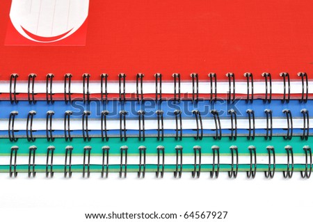 Spiral edge of three color rectangular notebooks
