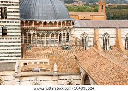 Detail of Siena Cathedral (Duomo di Siena) in Tuscan gothic style, Tuscany, Italy. This Cathedral is dedicated to Most Holy Mary of Assumption.