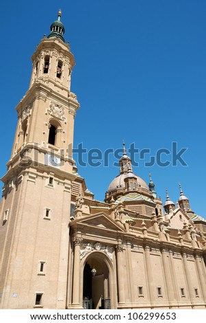 Basilica Cathedral of Our Lady of the Pillar in Zaragoza is supposed to be the first dedicated to Holy Mary. The first church on this site was Romanesque, then became Baroque style.